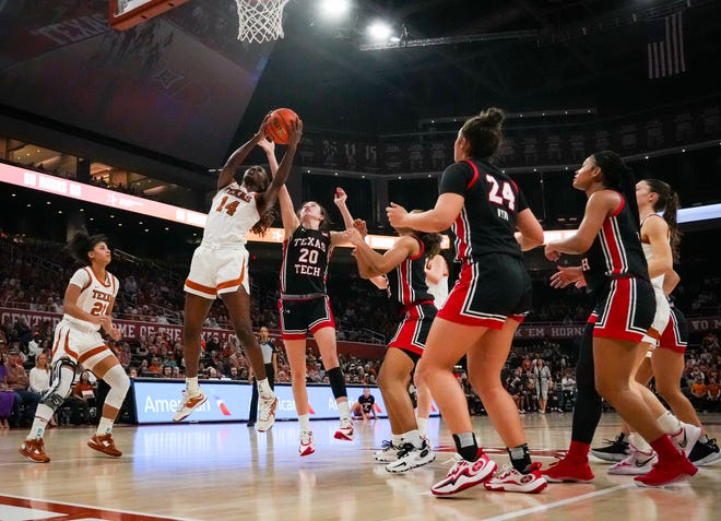 Texas forward Amina Muhammad grabs a rebound during the Longhorns' 77-72 win at Moody Center on Feb. 21. Muhammad, a key reserve who averaged 6.1 points and led the team in offensive rebounds, has entered the transfer portal.