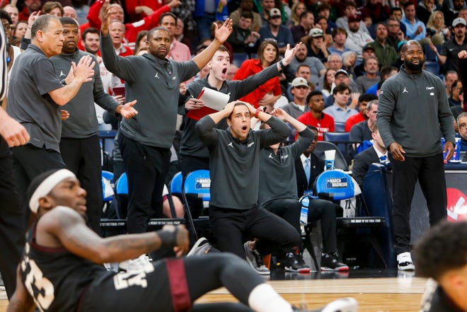 The Houston bench reacts after Terrance Arceneaux (23) was fouled during the second round game between Texas A&M and the University of Houston in the 2024 NCAA Tournament at FedExForum in Memphis, Tenn., on Sunday, March 24, 2024.