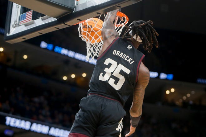 Texas A&M's Manny Obaseki (35) dunks the ball during the second round game between Texas A&M and the University of Houston in the 2024 NCAA Tournament at FedExForum in Memphis, Tenn., on Sunday, March 24, 2024.