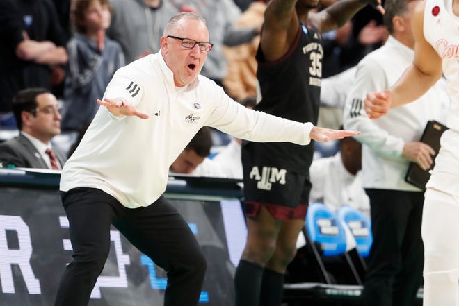 Texas A&M's head coach Buzz Williams signals to his team during the second round game between Texas A&M and the University of Houston in the 2024 NCAA Tournament at FedExForum in Memphis, Tenn., on Sunday, March 24, 2024.