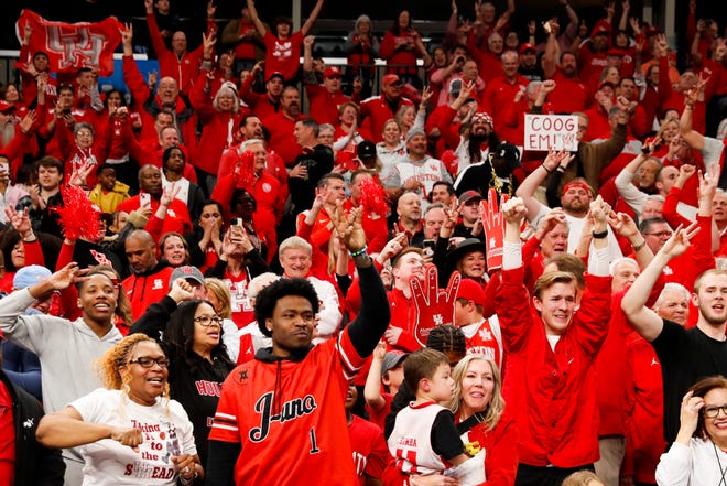 Houston fans cheer after Houston defeated Texas A&M 100-95 in overtime in the second round of the 2024 NCAA Tournament at FedExForum in Memphis, Tenn., on Sunday, March 24, 2024.
