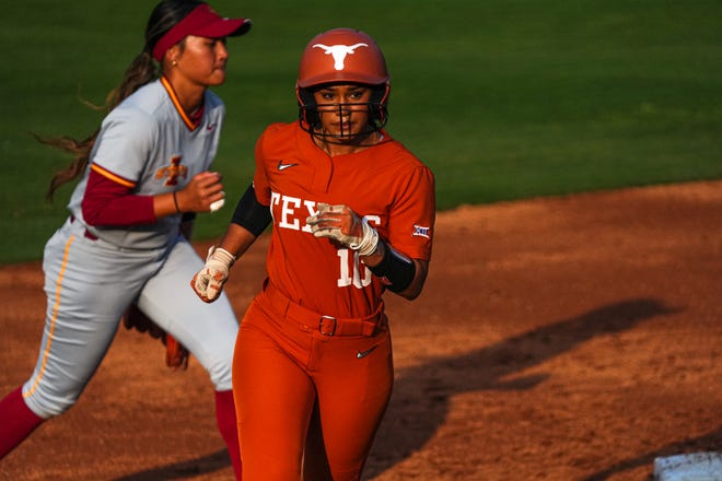 Texas Longhorns player Mia Scott (10) rounds second base after a home run hit during the game against Iowa State at Red and Charline McCombs Field on Friday, April 26, 2024 in Austin.