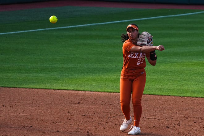 Texas Longhorns short stop Viviana Martinez (23) throws the ball to first during the game against Iowa State at Red and Charline McCombs Field on Friday, April 26, 2024 in Austin.
